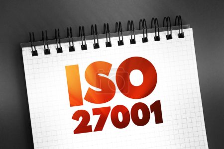 Téléchargez les photos : ISO 27001 - Norme internationale sur la gestion de la sécurité de l'information, concept de texte sur bloc-notes - en image libre de droit