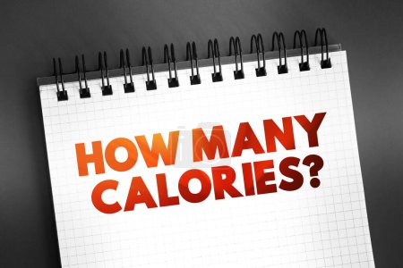 Photo for How Many Calories? text quote on notepad, concept background - Royalty Free Image