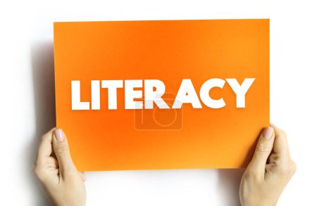 Foto de La alfabetización es la capacidad de leer, escribir, hablar y escuchar, concepto de texto en tarjeta para presentaciones e informes - Imagen libre de derechos