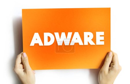 Téléchargez les photos : Adware - logiciel indésirable conçu pour lancer des publicités sur votre écran, concept de texte sur la carte - en image libre de droit