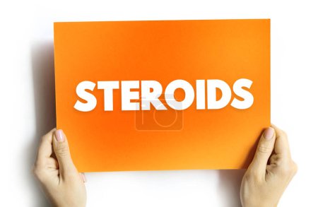 Photo for Steroids is a biologically active organic compound with four rings arranged in a specific molecular configuration, text concept on card - Royalty Free Image