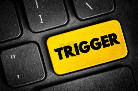 Foto de Trigger botón de texto en el teclado, concepto de fondo - Imagen libre de derechos