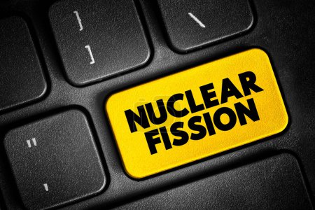 Foto de Nuclear Fission - reaction in which the nucleus of an atom splits into two or more smaller nuclei, text concept button on keyboard - Imagen libre de derechos