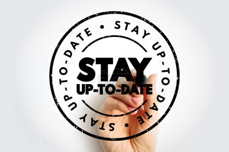 Téléchargez les photos : Stay Up To Date text stamp, concept background - en image libre de droit