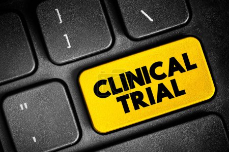 Clinical Trial - research studies performed in people that are aimed at evaluating a medical, surgical, or behavioral intervention, text concept button on keyboard