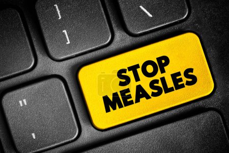 Photo for Stop Measles - get the measles, mumps, and rubella (MMR) vaccine,  text button on keyboard, concept background - Royalty Free Image