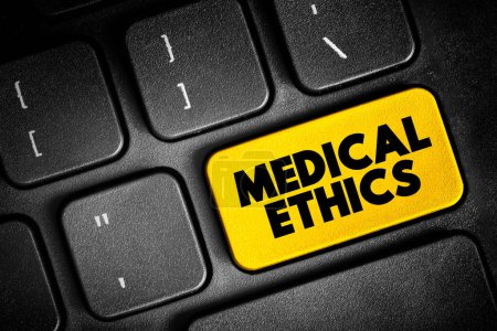 Foto de Ética médica - principios morales que rigen la práctica de la medicina, botón de texto en el teclado, fondo conceptual - Imagen libre de derechos