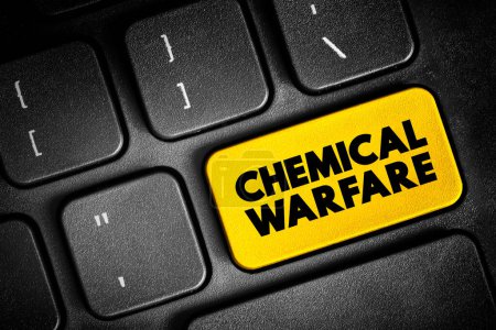 Foto de Guerra química: uso de las propiedades tóxicas de las sustancias químicas como armas, botón de texto en el teclado, fondo conceptual - Imagen libre de derechos