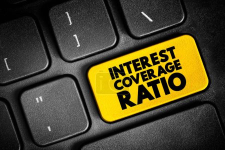 Foto de Ratio de cobertura de intereses es una medida de la capacidad de una empresa para honrar sus pagos de deuda, botón de texto en el teclado, fondo de concepto - Imagen libre de derechos