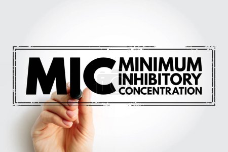 Photo for MIC Minimum Inhibitory Concentration - lowest concentration of a chemical, usually a drug, which prevents visible growth of a bacteria, acronym text concept stamp - Royalty Free Image