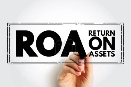 Téléchargez les photos : ROA Return On Assets - percentage of how profitable a company's assets are in generating revenue, acronym text stamp - en image libre de droit
