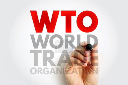 Téléchargez les photos : OMC Organisation mondiale du commerce - Organisation intergouvernementale qui réglemente et facilite le commerce international entre les nations, texte de l'acronyme contexte - en image libre de droit