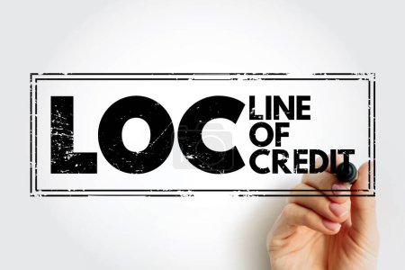 Téléchargez les photos : LOC - Line of Credit is a credit facility extended by a bank or other financial institution to a government, business or individual customer, acronym concept stamp - en image libre de droit