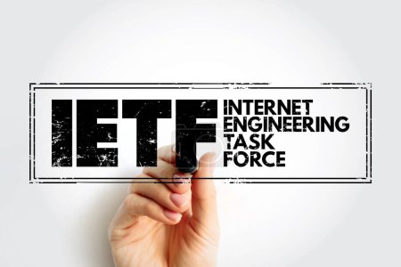 Téléchargez les photos : IETF Internet Engineering Task Force - open standards organization, which develops and promotes voluntary Internet standards, acronym text stamp - en image libre de droit
