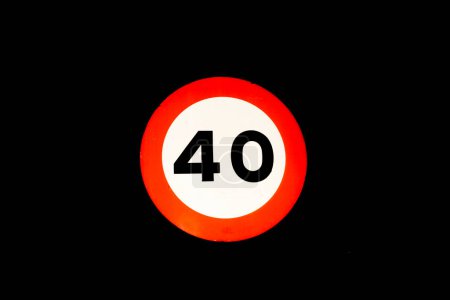 Photo for Speed limit traffic sign at 40 km hour horizontal black background - Royalty Free Image