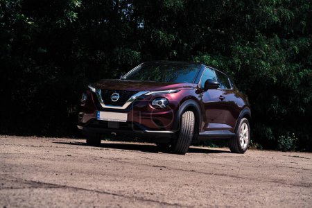 Photo for 16.06.2023 Kyiv, Ukraine : New Nissan Juke 2022 year in Burgundy color - Royalty Free Image