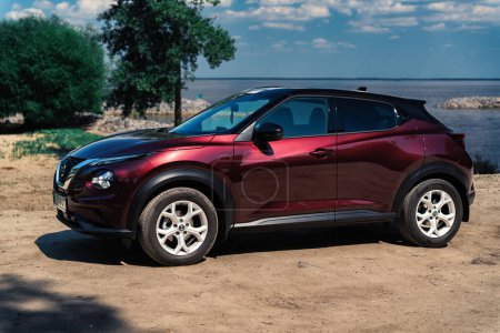 Photo for 16.06.2023 Kyiv, Ukraine : New Nissan Juke 2022 year in Burgundy color - Royalty Free Image