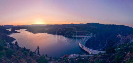 Photo for Sunset over the Atazar reservoir, it is the largest reservoir in the Community of Madrid. - Royalty Free Image