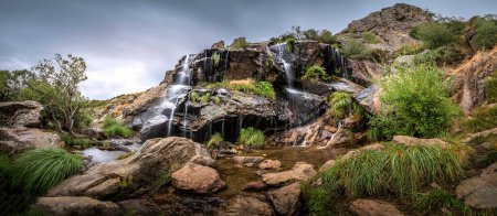 Photo for The Litueros waterfall is a waterfall located in the municipality of Somosierra, on the north face of the homonymous mountain pass, in the Community of Madrid. - Royalty Free Image