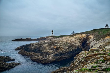 Photo for Galician coast, Isla Pancha Lighthouse in Ribadeo, Galicia, Spain. - Royalty Free Image
