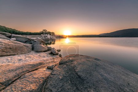 Photo for Reservoir, mysterious waters paint the dawn of a summer night - Royalty Free Image