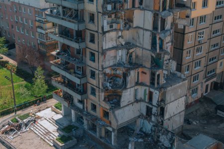 Photo for A Russian rocket flew into a residential building in the city of Dnipro, Ukraine. A residential building destroyed by an explosion after a Russian missile attack from above. Scars of war. - Royalty Free Image