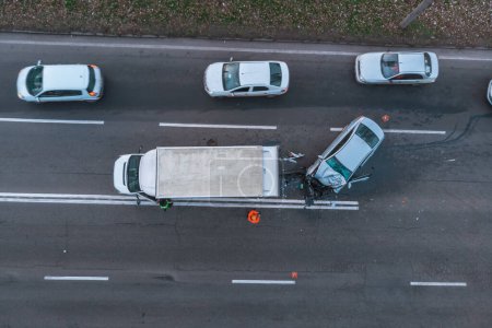 Severe accident. Car accidents. View from above. Accident, head-on collision of two cars. Violation of traffic rules, insured event. Drone photography.