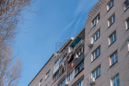 An attack drone (shahed) hit the roof of a house. Rocket attack on a residential building in the city of Dnepr. Consequences after a strong explosion. War in Ukraine and Russia. People under the rubble. Rescue operation