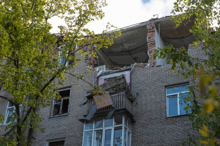 Photo for A Russian missile hit a residential building in the city of Dnepr, Ukraine. Damaged apartment building after a massive missile attack on 04/19/24. Scars of war. Consequences of the attack - Royalty Free Image