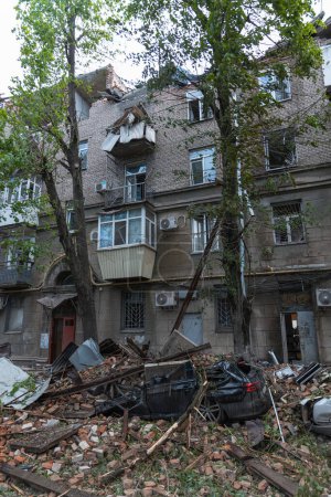Photo for A Russian missile hit a residential building in the city of Dnipro, Ukraine. Damaged apartment building after a massive missile attack on 04.19.24. Scars of war. Consequences of the attack - Royalty Free Image