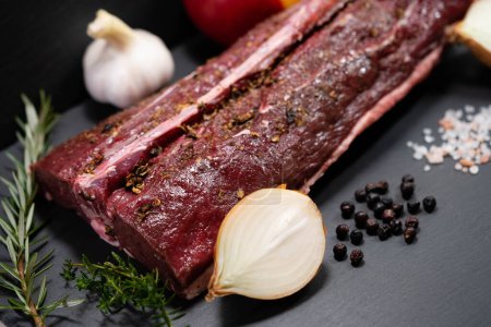 saddle of venison with herbs and spices