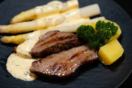 Tafelspitz of veal with asparagus and parsley sauce