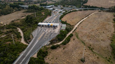 Photo for Italian motorway toll booth seen from above. Paved road - Royalty Free Image