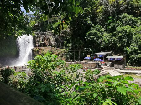 Photo for Bali,Indonesia - September 27 2023 : Beautiful Tegenungan waterfall in gianyar regency of Bali.Looks the waterfall so clear with many visitors during a sunny day. - Royalty Free Image