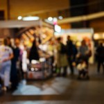 Blurred Shot Of People Walking Indoors At Food And Food Technology Exhibition, Riga, Latvia. High quality photo