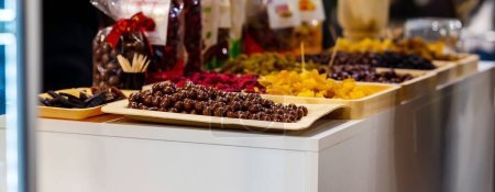 Photo for Trays With Sweets And Round Chocolates For Tasting. Small Depth Of Field. High quality photo - Royalty Free Image