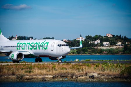 Photo for Kerkyra, Greece - 09 24 2022: Corfu Airport, Transavia Plane On Runway. The importance of punctuality in air travel. High quality photo - Royalty Free Image