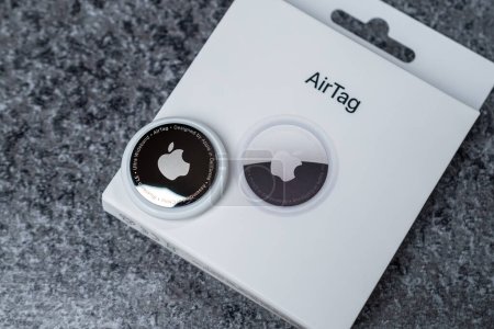 Photo for Jurmala, Latvia - 21 09 2023: Close-up of the gadget to track of your stuff - AirTag Apple. Air Tag on box. High quality photo - Royalty Free Image