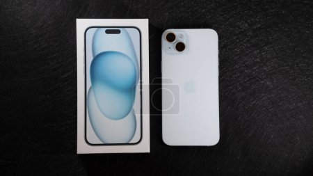 Photo for Jurmala, Latvia - 09 01 2024: On black table new smarphone apple iPhone 15 Plus in Blue color and white box. High quality photo - Royalty Free Image