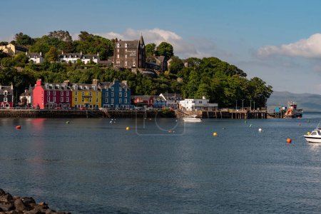 Photo for Tobermory, Isle of  Mull, Scotland, UK. 6 June 2023. Picturesque Scottish coastal town with colourful painted houses overlooking the Tobermory harbour. - Royalty Free Image