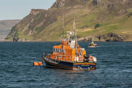 Photo for Portree, Isle of Skye, Scotland, UK. 5 June 2023. Lifeboat at anchor off shore - Royalty Free Image