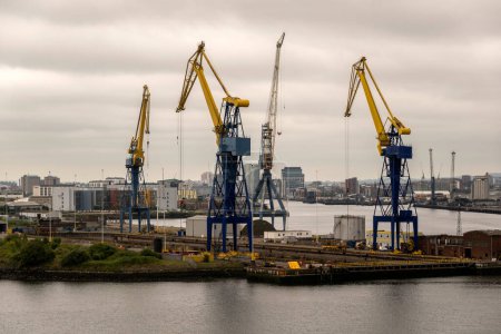 Photo for Belfast, Northern Ireland, UK. 7 June 2023. Cranes and a dry dock in the Port of Belfast, an overview. - Royalty Free Image