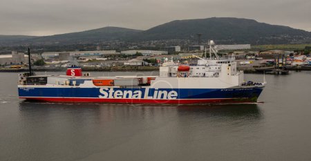 Photo for Belfast, Northern Ireland, UK. 7 June 2023. A Stena Line roll on roll off ferry underway on the River Lagan, Port of Belfast - Royalty Free Image