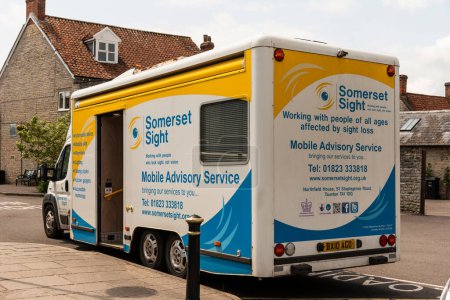 Photo for Somerton, Sumerset, England, UK. 21st June 2023. Somerset Sight loss vehicle working with people of all ages with sight loss problems parked in the small town of Somerton. - Royalty Free Image