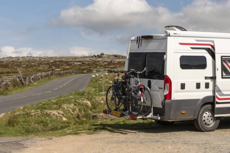 Photo for Dartmoor, Devon, England, UK. 4th September 2023. Durch registered  motorhome parked  with bicycles on a rack  alongside the road on Dartmoor, Devon, UK - Royalty Free Image