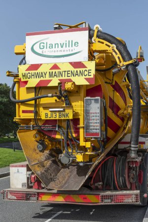 Photo for Princetown, Devon, England, UK.  04.09.2023.  Highway maintenance high pressure water jetting truck  for gully emptying and cleansing. - Royalty Free Image