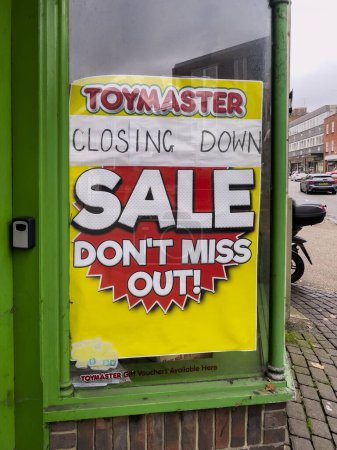 Photo for Winchester Hampshire England UK.  13.10. 2023. Closing down sale sign on a toy shop window in the city centre of Winchester, UK - Royalty Free Image