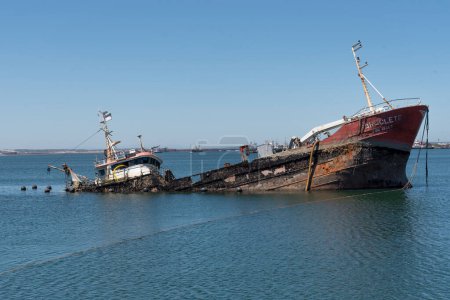 Photo for Saldanha South Africa. 18/02/24.  Fishing boat sunk on Saldanha harbour on the west coast of South Africa - Royalty Free Image