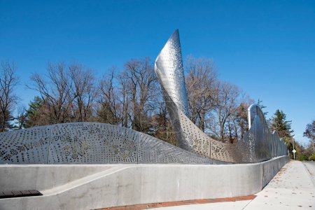 Photo for Kettering, Ohio, USA - November 15, 2023: FOLIAGE stainless steel sculpture by Cliff Garten Studio (Venice, CA), commissioned by City of Kettering to integrate the landscape of Hills & Dales MetroPark and Kettering into the new Ridgeway Rd bridge. - Royalty Free Image