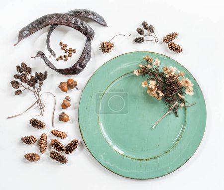 Green Plate with Various Autumn Nature Items